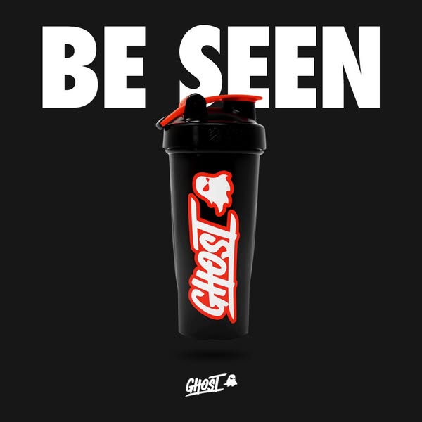 This ad features a product image of a black Ghost shaker bottle against a black background. The text "BE SEEN"