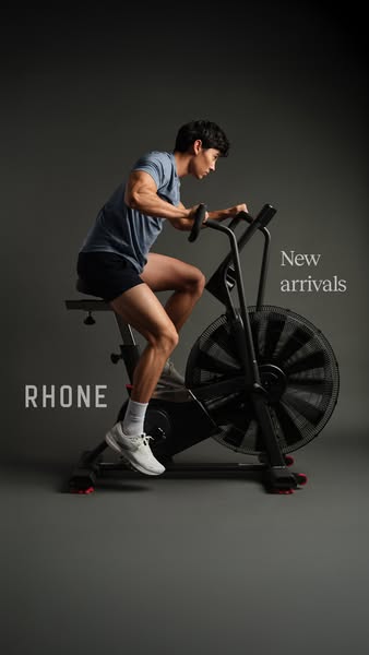 This Rhone ad features a man on an exercise bike and is designed to promote the brand's new arrivals. The ad conveys