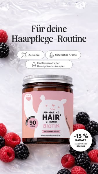 The image ad promotes AH-MAZING HAIR* VITAMIN BIOTIN hair vitamins. The ad features a jar of hair vitamins, and highligh