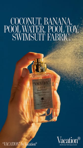 A hand holding a bottle of 'Vacation' brand perfume dispenses the spray, while the upper portion of the image li