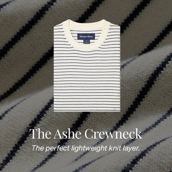 This image ad features a folded Mizzen+Main Ashe Crewneck t-shirt. The ad emphasizes the shirt's lightweight knit an