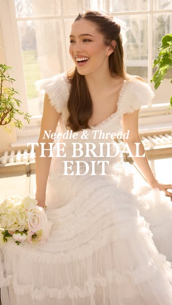 This image ad promotes Needle & Thread's Bridal Edit, featuring a woman in a ruffled wedding gown, aiming to cap
