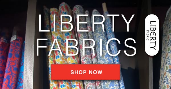 An ad showcasing Liberty Fabrics, inviting viewers to shop now.