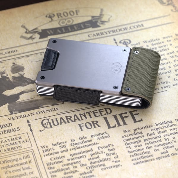 This image ad features a Proof wallet with an accompanying image and text that highlights the product's lifetime gua