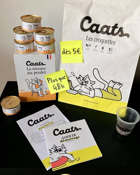This ad showcases cat food and products from Caats. The ad features canned mousse, dry food, and informational pamphlets