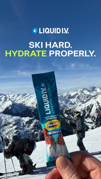 An ad for Liquid I.V. featuring a packet of their hydration multiplier electrolyte drink mix in the popsicle firecracker