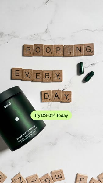 This ad features Seed DS-01 Daily Synbiotic pills. The ad's headline states 'Pooping Every Day' written usin