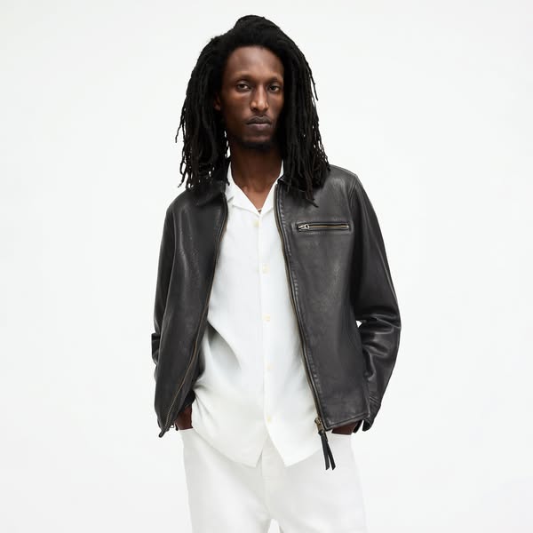 This ad features a man wearing a black leather jacket and white pants. The ad focuses on the jacket and its style.