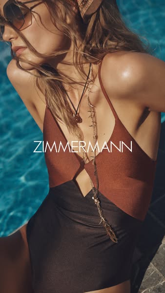 This ad showcases a Zimmermann swimsuit featuring a woman posing by the water.