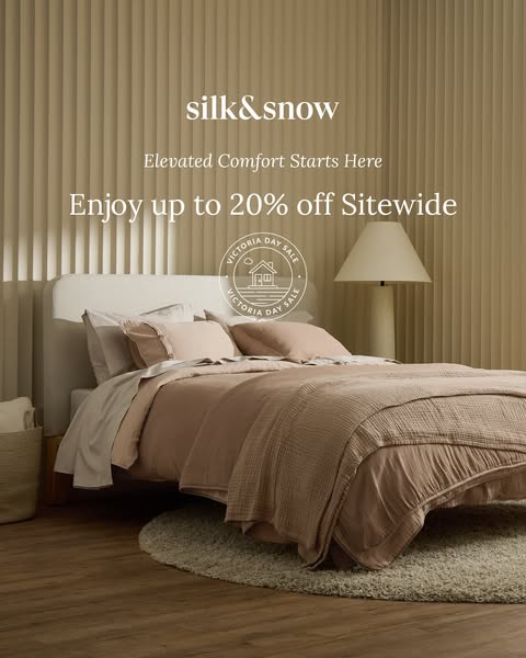 This ad for Silk & Snow features a bedroom scene, showcasing a made bed with a throw blanket. The ad promotes a sale