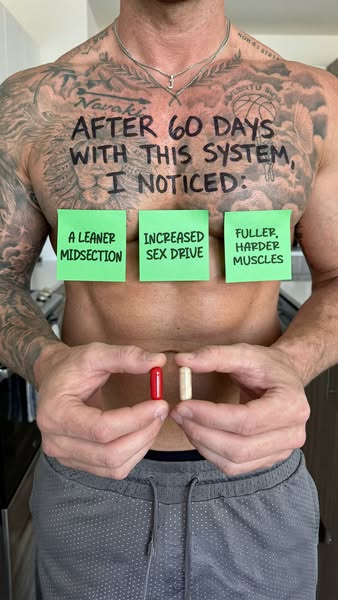 An image ad from a shirtless, muscular man covered in tattoos holding two pills and presenting them as the solution to t
