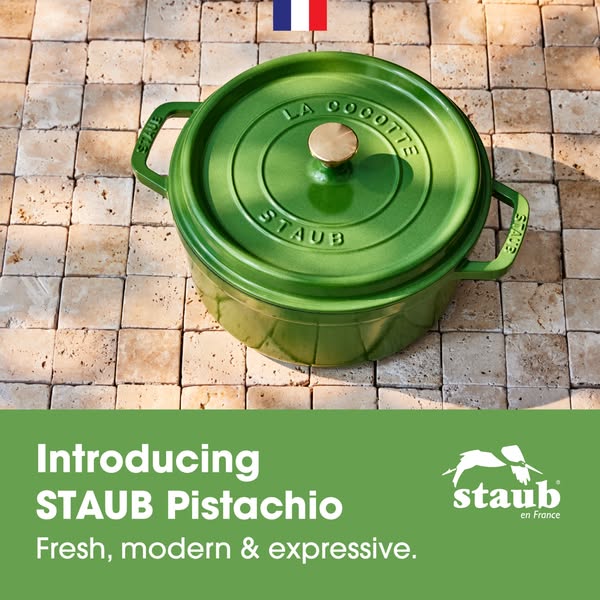 This ad showcases a green STAUB La Cocotte on a tan tiled surface. The ad presents the product as fresh, modern, and exp