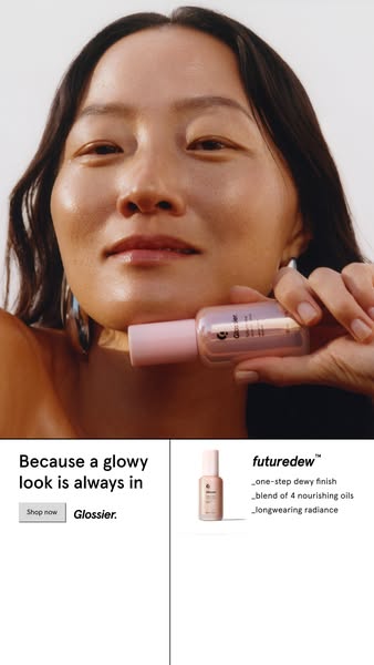 This ad features a close-up of a woman with glowing skin, holding a bottle of Glossier's Futuredew. The ad emphasize