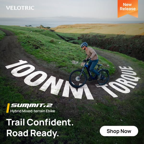 This image ad for Velotric advertises the Summit.2 Hybrid Mixed-terrain Ebike. The image features a man riding the bike 