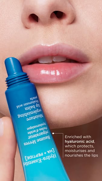 This ad features a close-up of a woman's face with a focus on her lips, highlighting the use of a lip balm. The ad e