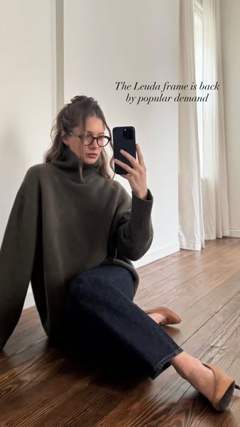 An ad featuring a woman wearing glasses. The text overlay indicates the frame is back by popular demand.