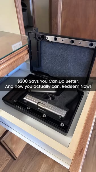 A handgun is visible inside of an open gun safe that is installed in a drawer. The ad implies that the consumer may want