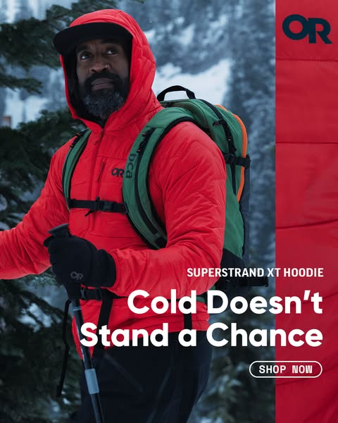 This ad features a man in a red hooded jacket in a snowy environment. The ad promotes the SUPERSTRAND XT HOODIE, emphasi