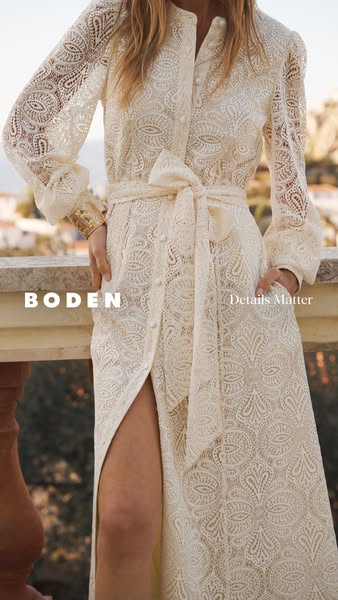 This image ad showcases a cream-colored lace midi dress from Boden.