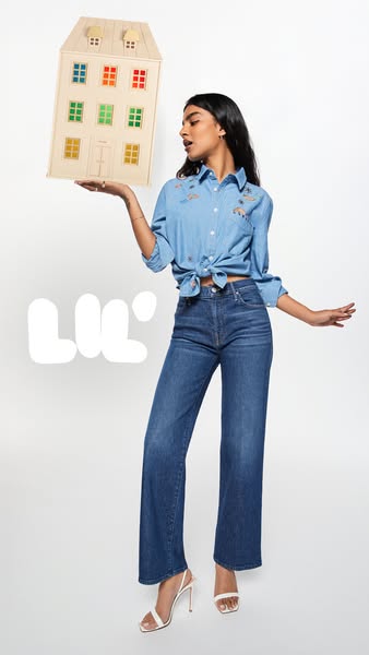 This ad presents a full-body shot of a woman modeling a pair of jeans from the brand. She is holding a doll house in one