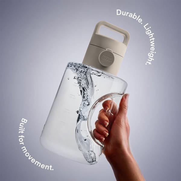 This ad features a Frank Green water bottle and highlights its durability, light weight, and portability. A woman's 
