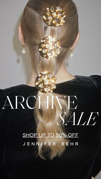 This image ad for Jennifer Behr promotes an archive sale with up to 50% off. The ad features a woman with blonde hair st