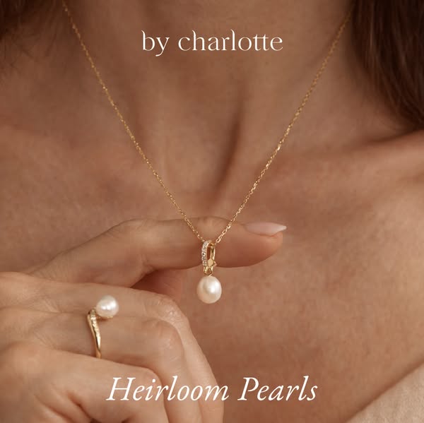 This image ad showcases By Charlotte jewelry, specifically a pearl necklace and ring. The ad targets customers looking f