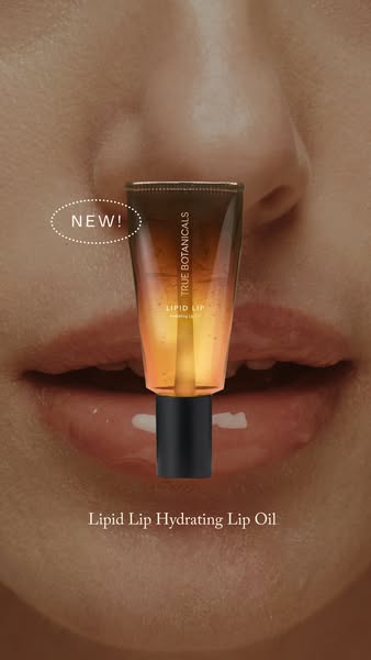 This ad features a close-up shot of True Botanicals Lipid Lip Hydrating Lip Oil being applied to lips, highlighting the