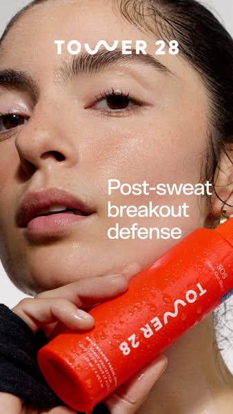 This ad for Tower28 features a close up of a woman's face with the Tower28 SOS spray in her hand and promotes the pr