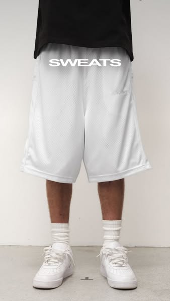 This ad features a person wearing a pair of white mesh shorts with the word "SWEATS" in white text on the uppe