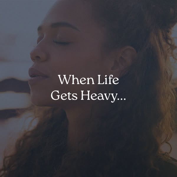An image ad featuring a person in a tranquil state with the text overlay 'When Life Gets Heavy...' implying the 