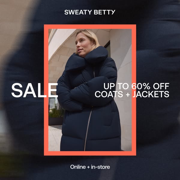 This image ad by Sweaty Betty promotes a sale of up to 60% off on coats and jackets, available both online and in-store.
