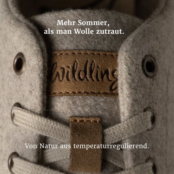 This ad features a close-up shot of Wildling wool shoes, highlighting their natural temperature-regulating properties. T