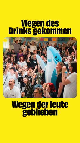 This ad features a crowd of people standing closely together with their arms raised in the air with black overlaid text 