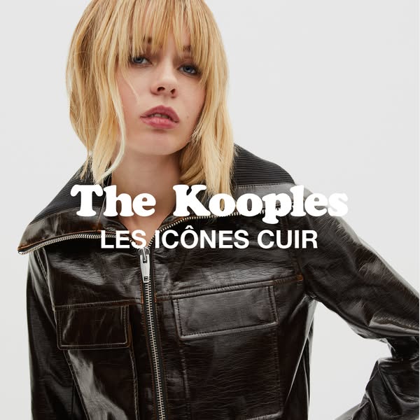 This image ad showcases a woman wearing a brown leather jacket by The Kooples. The brand name and tagline are displayed 