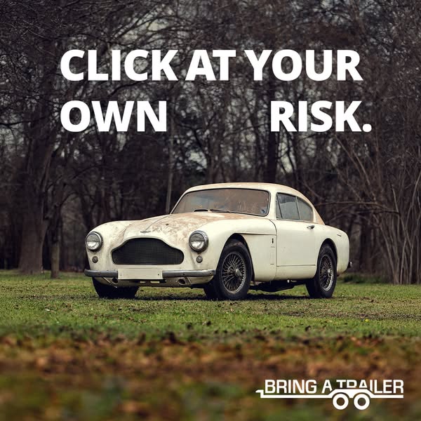This image ad shows an older model white car in a grassy field with bare trees in the background and the tagline "C