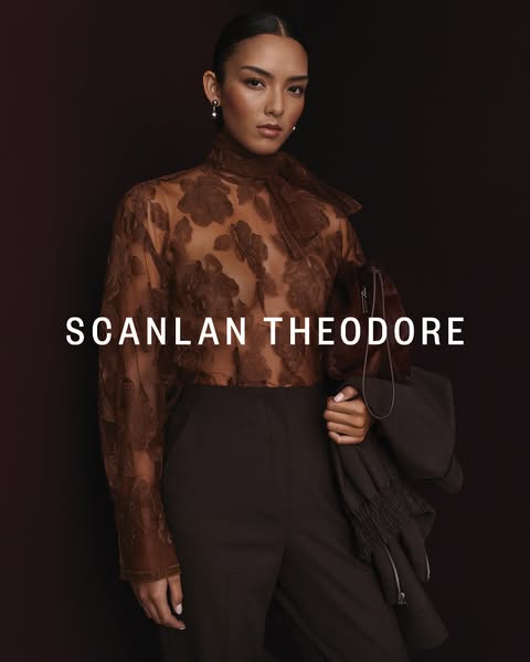 This ad showcases a woman in a floral top and dark slacks with the brand name underneath.