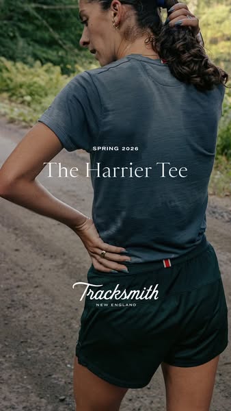 This ad showcases the Harriet Tee and running shorts from the athletic brand Tracksmith. The image features a woman outd