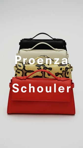 This ad for Proenza Schouler features a stack of the brand's handbags in various colors and patterns. The brand name
