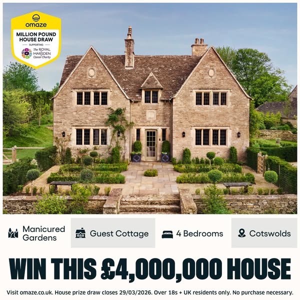 This ad features an image of a large stone house with manicured gardens, promoting a chance to win it through a prize dr