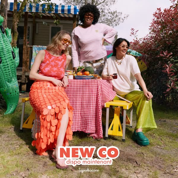 The ad features three women enjoying an outdoor gathering, showcasing the brand's latest collection in a cheerful an