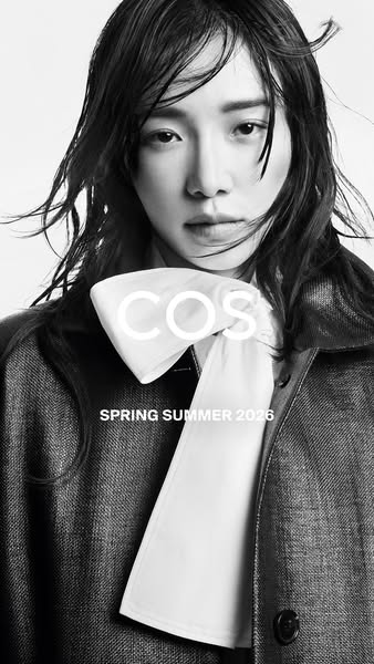 This is a black and white image ad for COS clothing, promoting the brand's Spring Summer 2026 collection. The ad fea