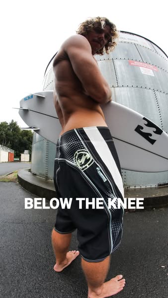 This image ad features a male surfer, and it highlights a specific type of swimwear that goes below the knee.