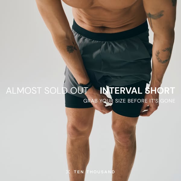 This image ad for Ten Thousand features a torso shot of a fit man wearing gray and black Interval Shorts. The ad utilize