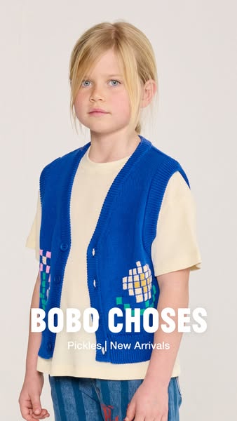 This image ad is promoting a new arrivals collection from the brand Bobo Choses featuring a young model wearing a blue v