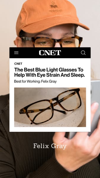 An image promoting Felix Gray brand blue light glasses that features a review from CNET.