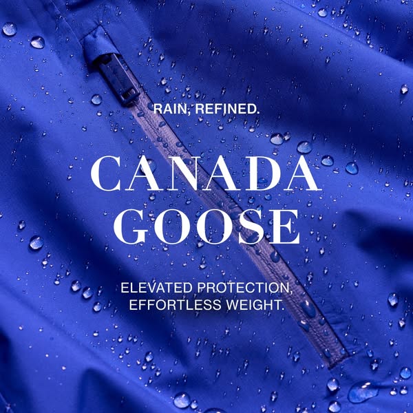 Close up image of a blue Canada Goose jacket with droplets of water on the fabric. The ad promotes the jacket's elev