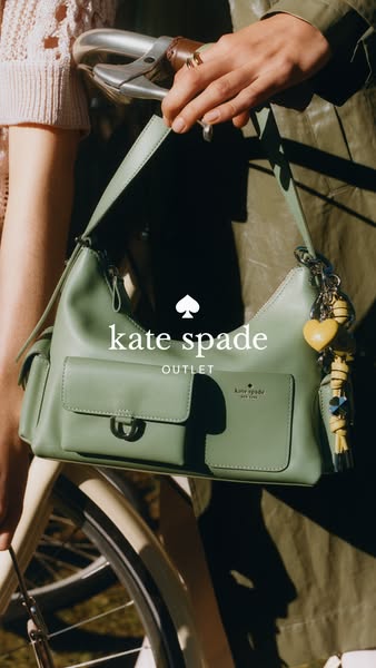 The ad features a shoulder bag in a light green color. It is being held in front of a bicycle.