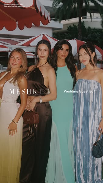 This image ad is promoting Meshki's Wedding Guest Edit collection. Four women are seen posing together, each wearing