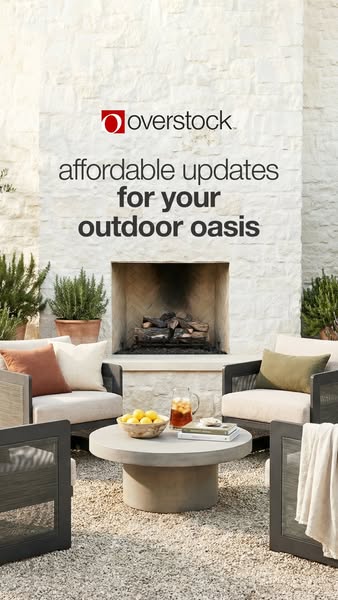 This ad for Overstock features an outdoor living space with two chairs, a fireplace, and a low table. The ad headline st